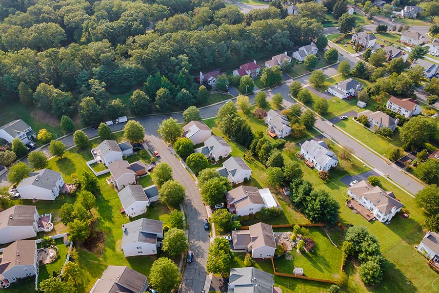 Lancaster, OH - Aerial View of a Small Town in the Countryside of Cleveland Displaying Houses and Trees